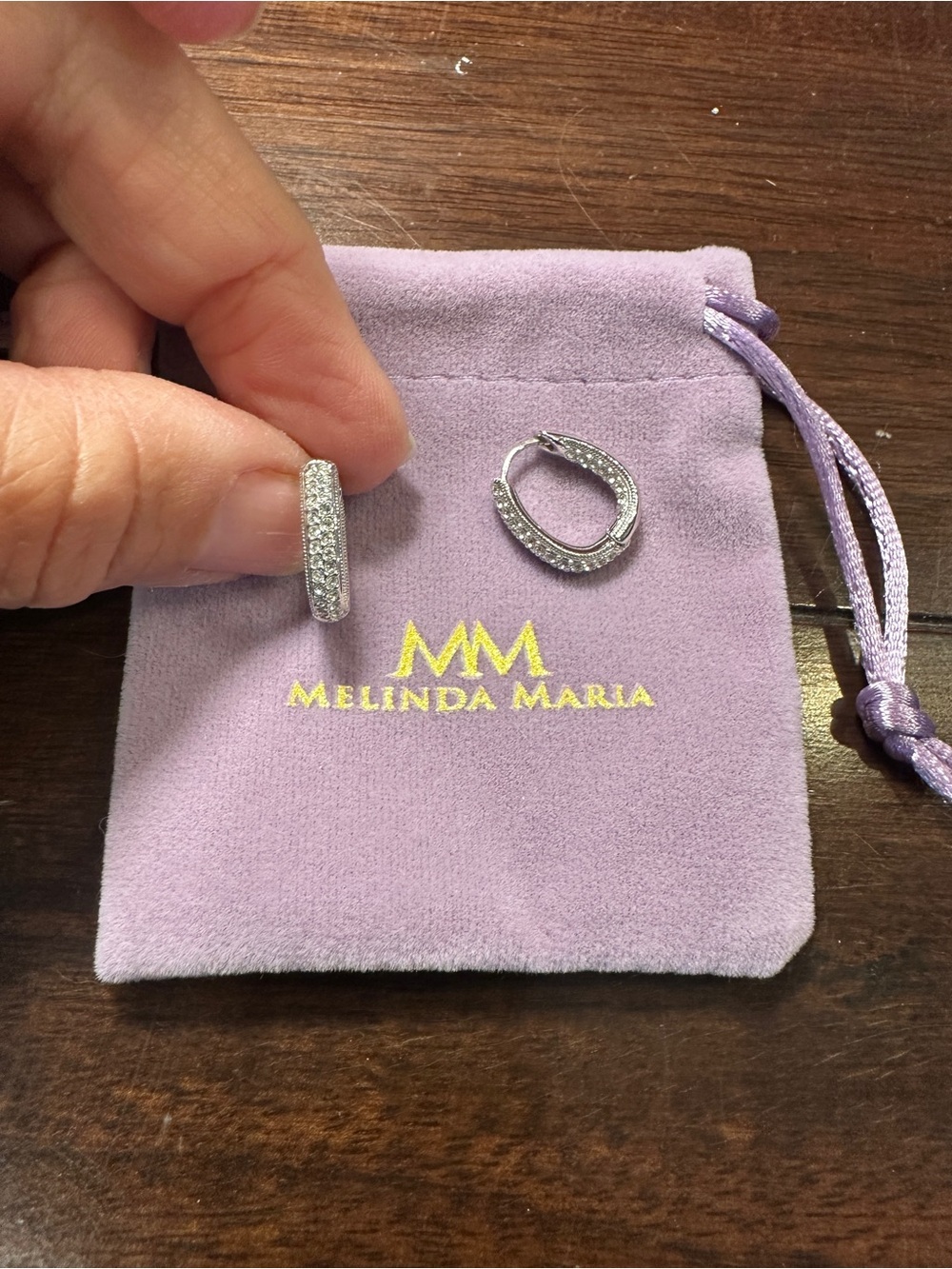 Melinda Maria Silver Simulated Diamond “inside out” Hoop Earrings with pouch.
